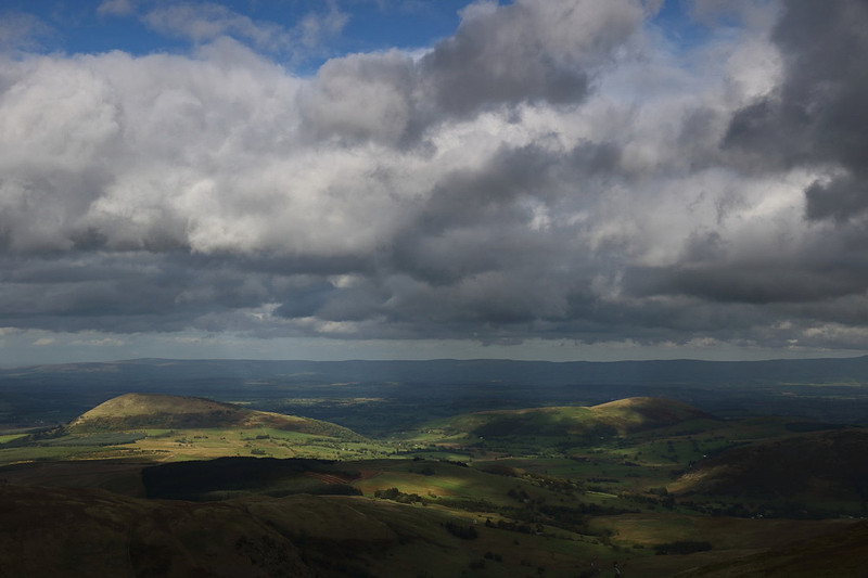 Great Mell Fell and Little Mell Fell from Hart Side Summit with the Pennines in the distance
